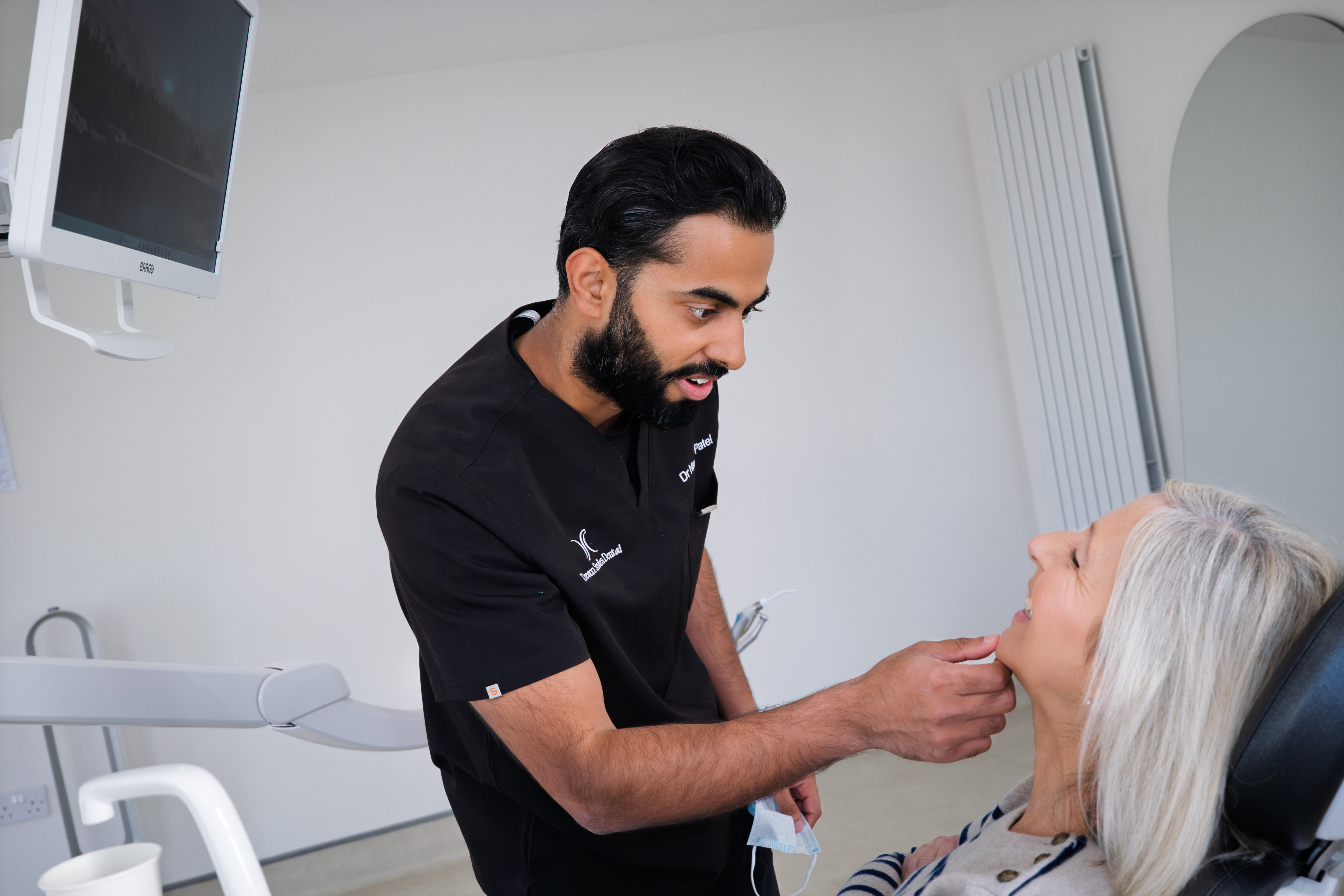 Patient at a review appointment with Dr Patel at Dream Smiles Dental