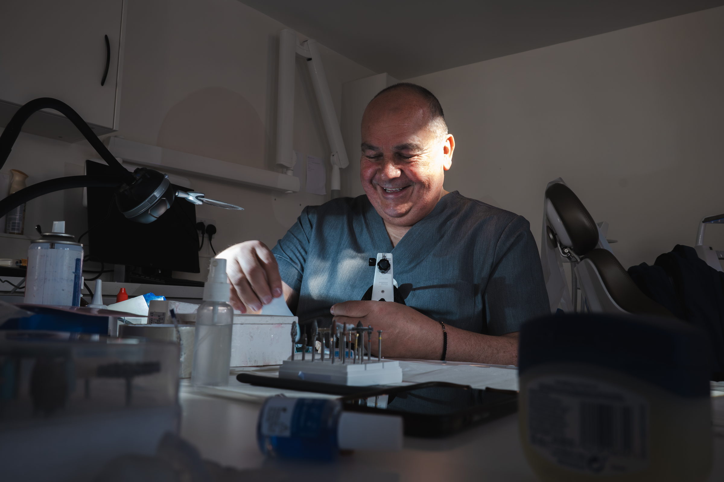 John Wibberley crafting a denture in the laboratory at Dream Smiles Dental in Bolton