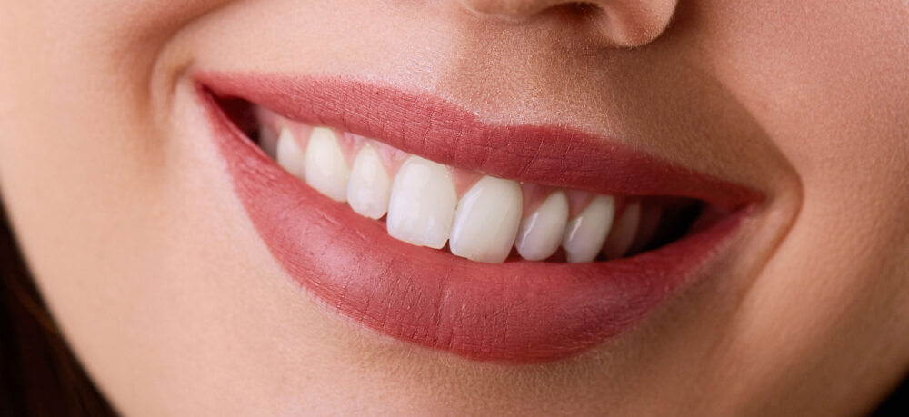 Closeup Beautiful young woman smile